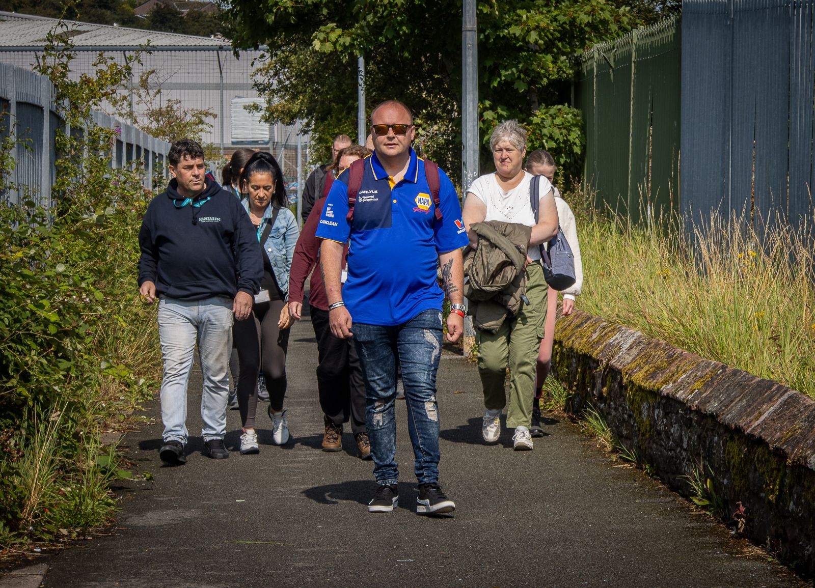 Group coming along footpath